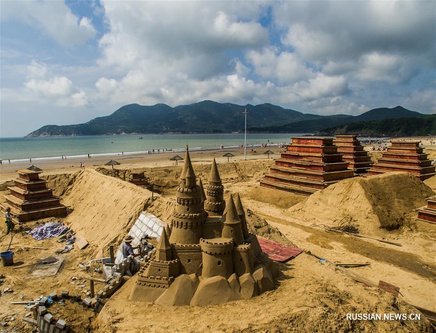 Выставка песчаной скульптуры, посвященная саммиту "Группы 20", открылась в Чжоушане