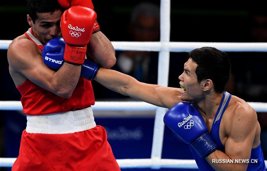 Казахстанский боксер Д. Елеусинов завоевал олимпийское "золото" в категории до 69  кг 