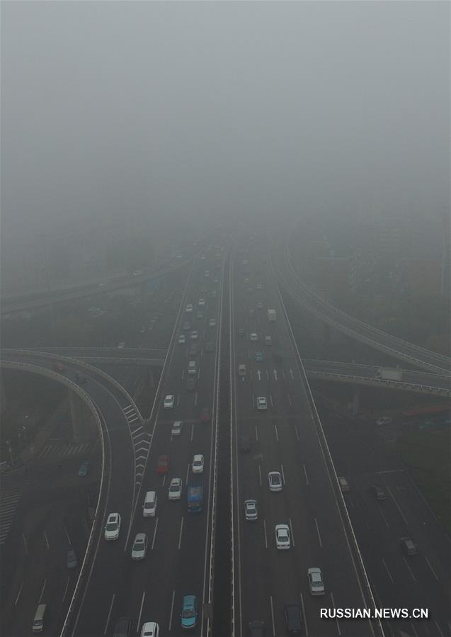 Смог в Тяньцзине: метеорологи объявили "оранжевое" предупреждение