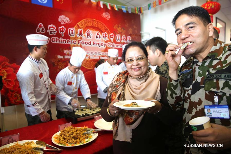 Китайские миротворцы устроили благотворительную дегустацию китайских блюд в штабе ВСООНЛ 