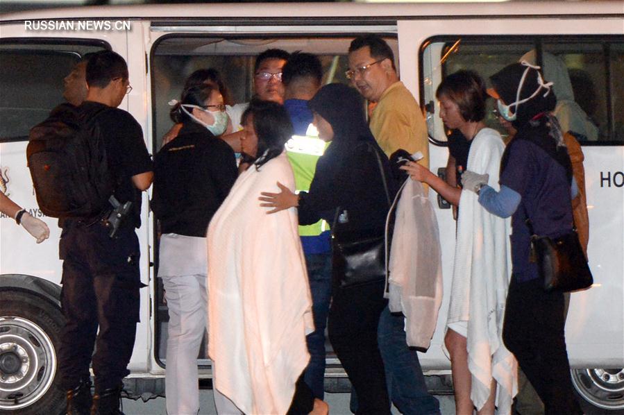 （国际）（7）马来西亚沙巴州沉船事件获救中国游客抵达哥打基纳巴卢 