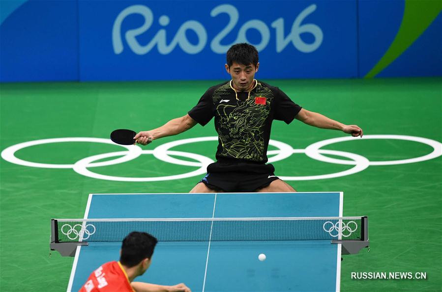 /Олимпиада-2016/ Китайский спортсмен Чжан Цзикэ завоевал серебро в олимпийских соревнованиях  по настольному теннису в одиночном разряде