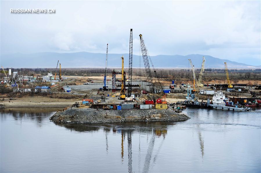 Строительство железнодорожного моста на российско-китайской границе в провинции Хэйлунцзян