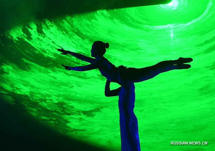 Музыкально-танцевальное шоу по мотивам легенд народности туцзя в Чунцине