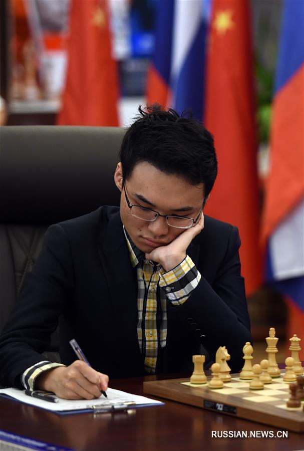 Шахматы -- Китайско-российский товарищеский турнир в Цзяюйгуань: первые два матча завершились ничьей