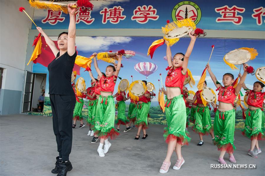 Танец с плоским барабаном -- культурное наследие провинции Хэбэй