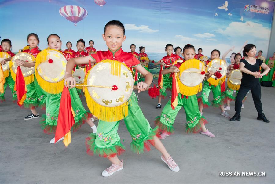 Танец с плоским барабаном -- культурное наследие провинции Хэбэй