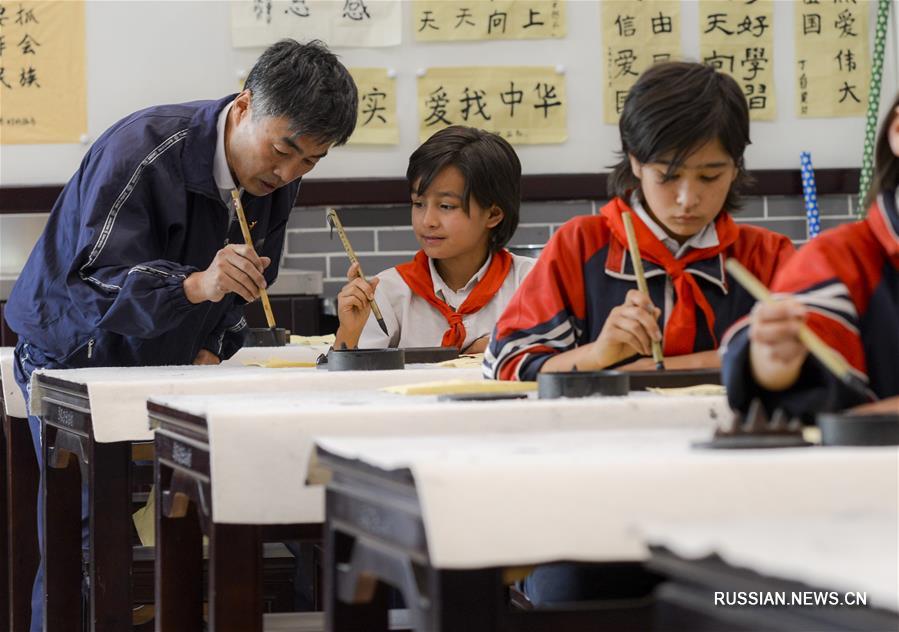 Начальное образование в отделенных районах Синьцзян-Уйгурского АР