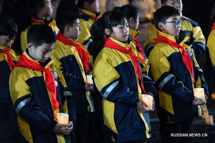 Панихида со свечами по жертвам Нанкинской резни