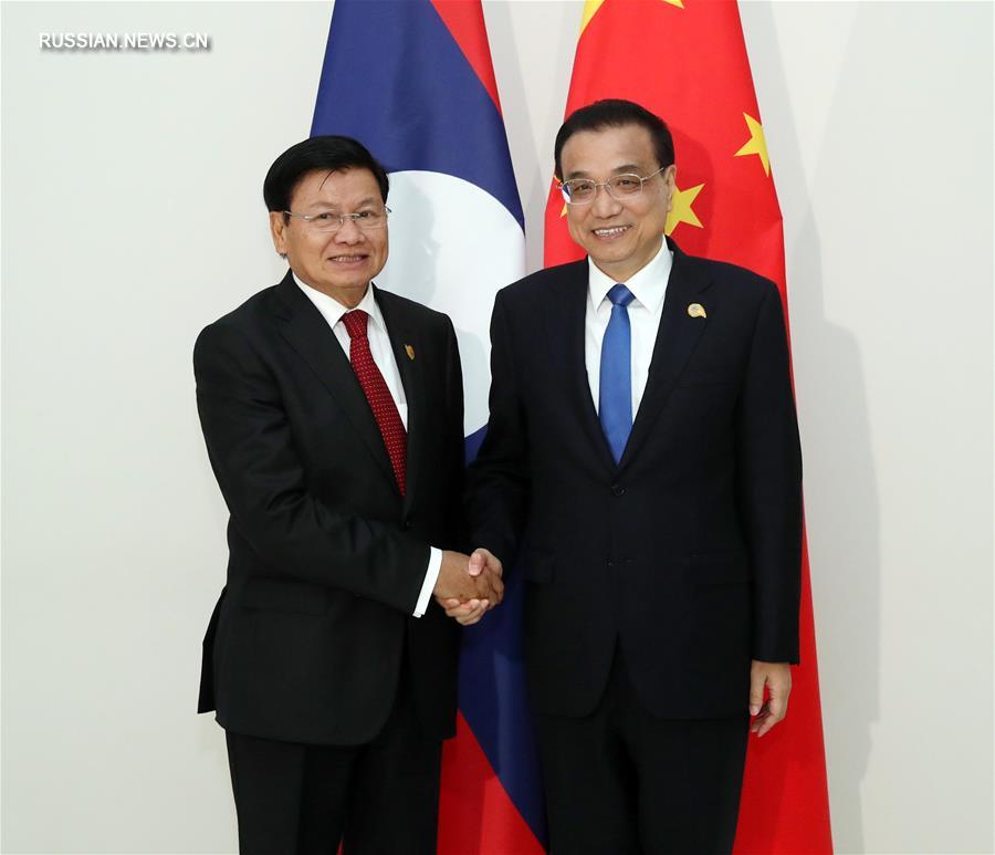 （时政）李克强会见老挝总理通伦