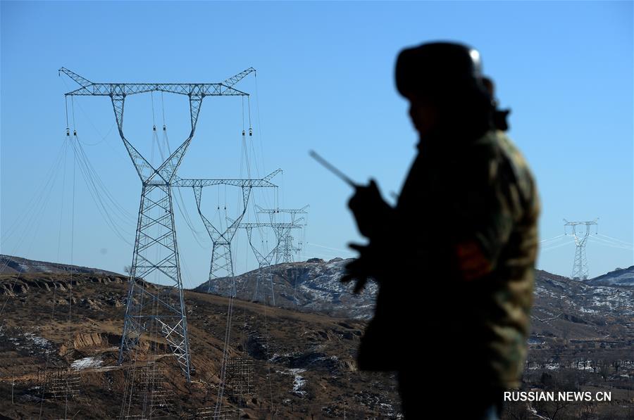 В Юйлине начался монтаж проводов на первой высоковольтной линии для поставок электричества за пределы провинции Шэньси