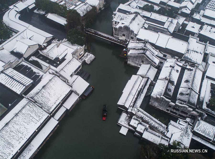 Древний поселок Учжэнь превратился из "деревни на воде" в "деревню снега"