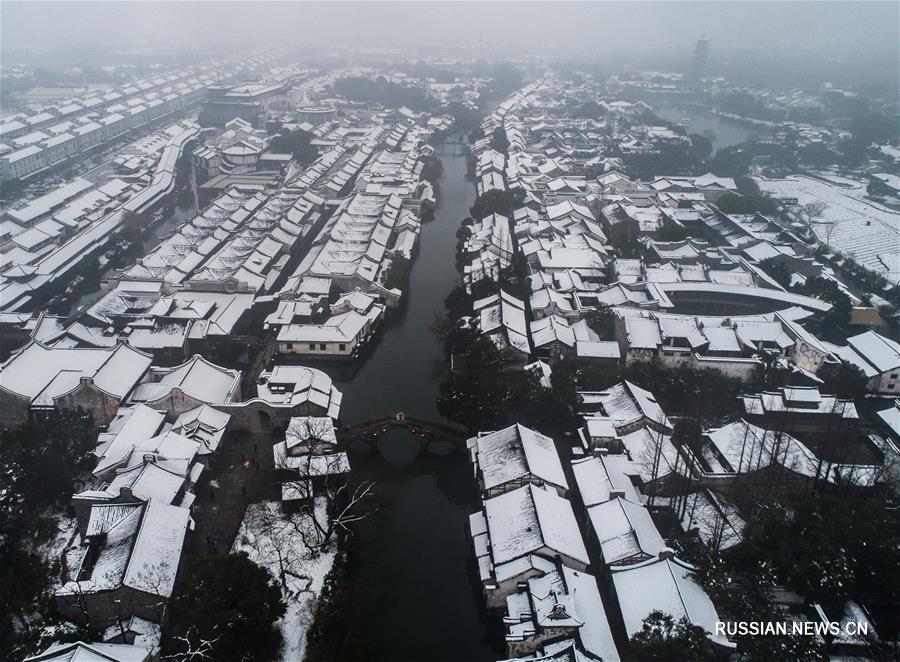 Древний поселок Учжэнь превратился из "деревни на воде" в "деревню снега"