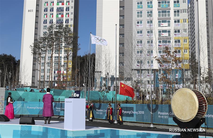 Церемония поднятия государственного флага КНР состоялась в олимпийской деревне в  Канныне