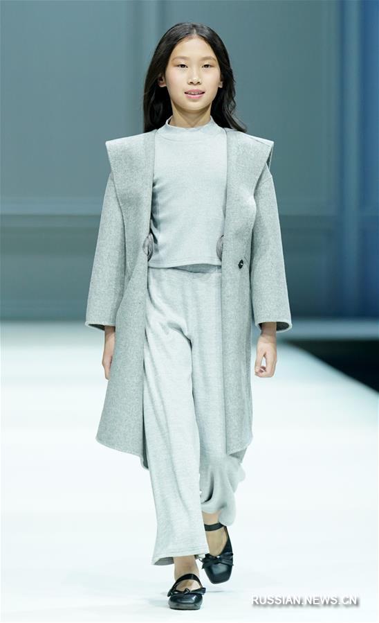 Презентация одежды от бренда LE LUPERCUS на Китайской неделе моды в Пекине