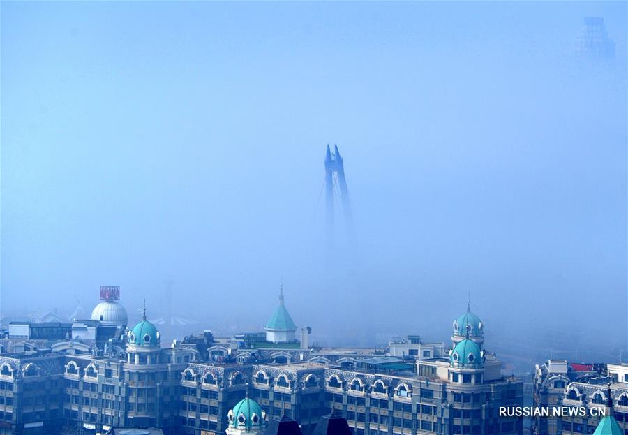 Окутанный туманом Далянь