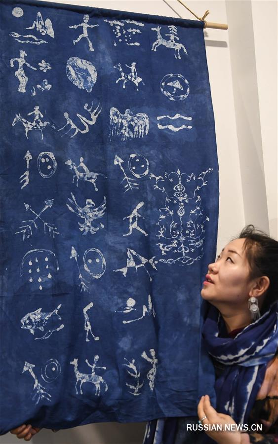 Ли Аньди -- художник-дизайнер из провинции Цзилинь, интересующаяся культурой шаманизма
