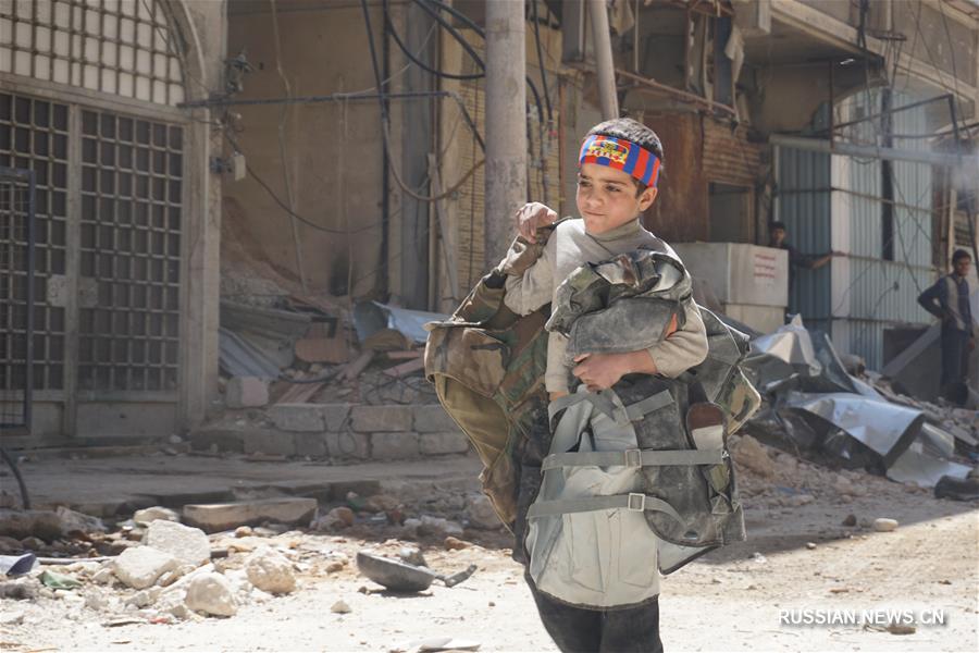 Населенный пункт Дума на восточной окраине Дамаска после авиаударов США, Великобритании  и Франции по Сирии 