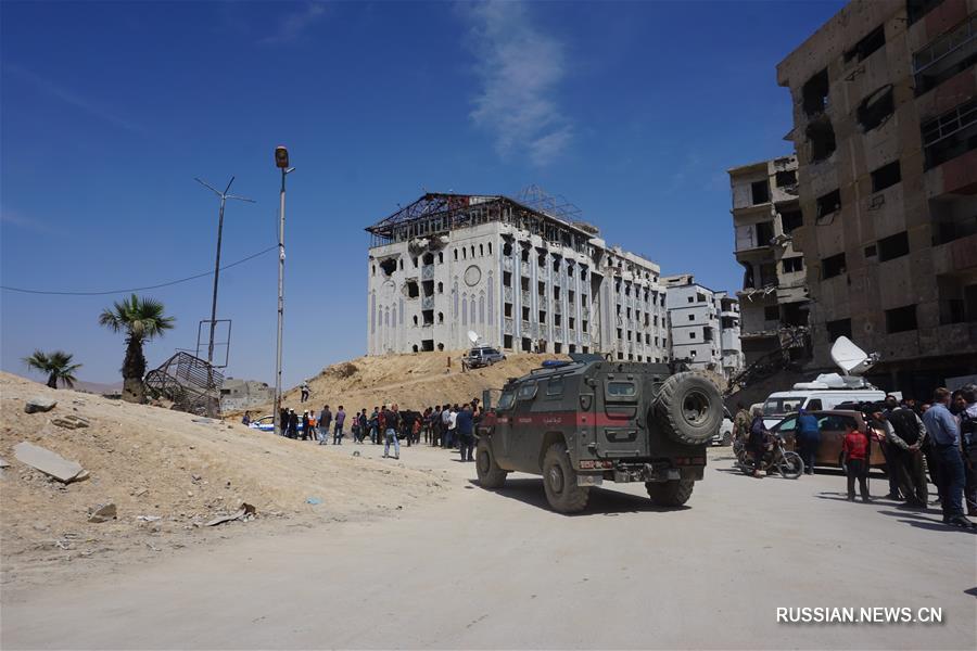 Населенный пункт Дума на восточной окраине Дамаска после авиаударов США, Великобритании  и Франции по Сирии 