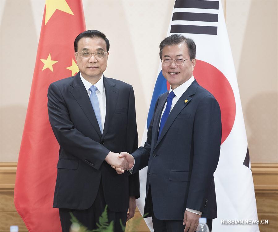 Ли Кэцян в Токио встретился с президентом РК