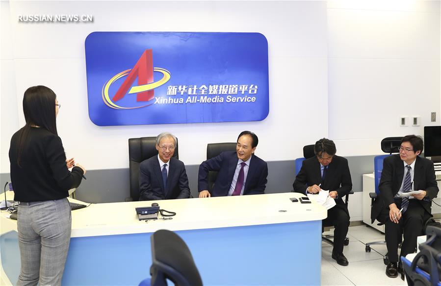 Гендиректор ИА "Синьхуа" Цай Минчжао встретился с главой ИА "Киодо Цусин"