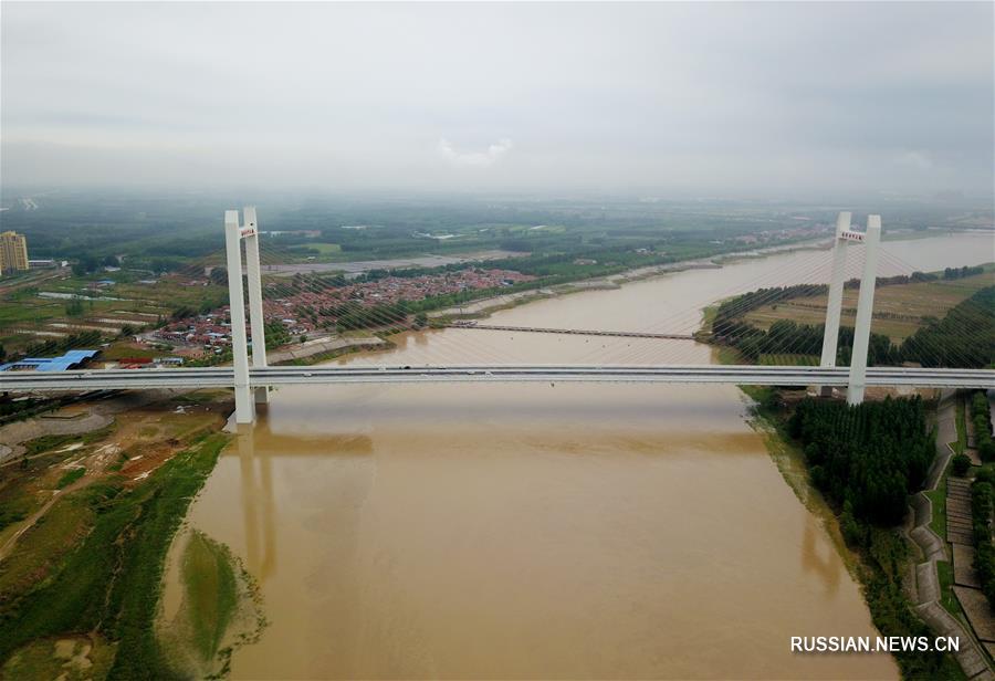 В уезде Цихэ введен в эксплуатацию новый автомобильный мост через Хуанхэ
