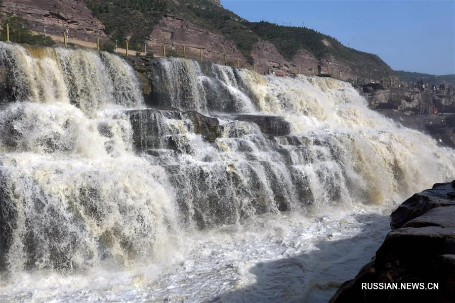 Увеличение стока на водопаде Хукоу