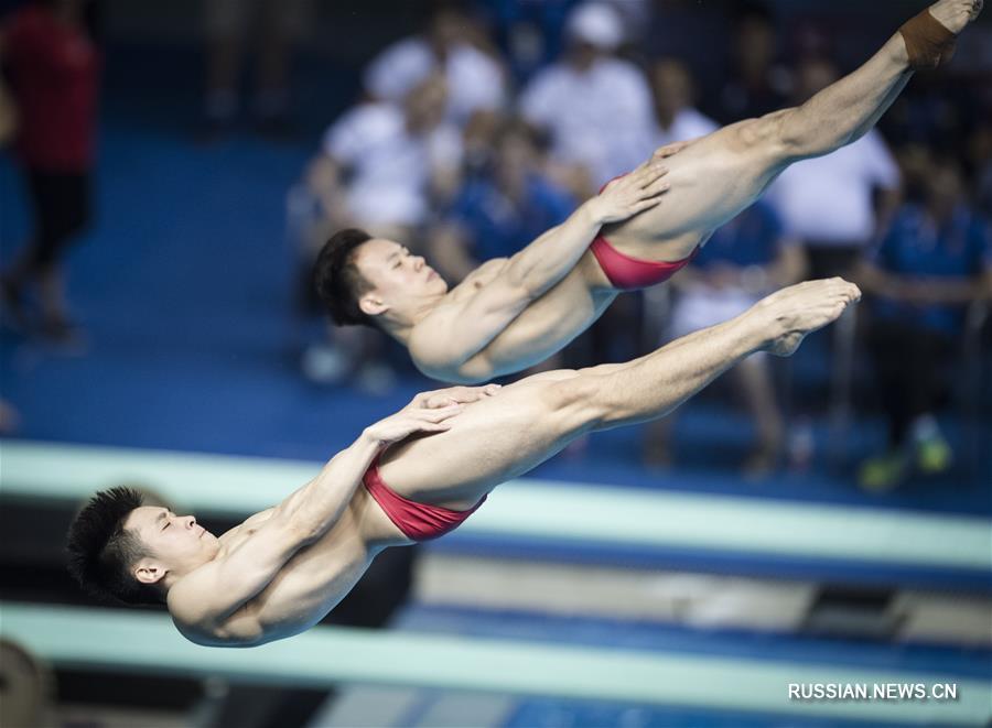 Кубок мира FINA по прыжкам в воду: китайские спортсмены выиграли золото в синхронных  прыжках в воду с трехметрового трамплина