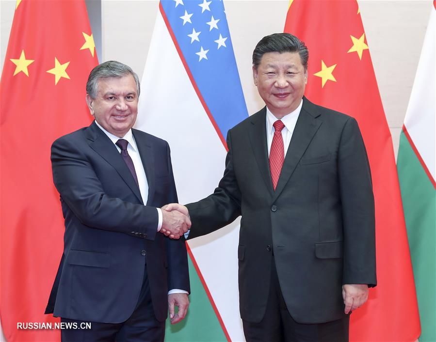（上合青岛峰会）习近平会见乌兹别克斯坦总统米尔济约耶夫