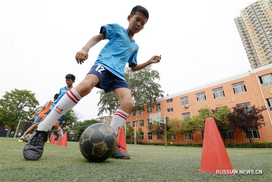 Футбольный бум на школьных стадионах Китая