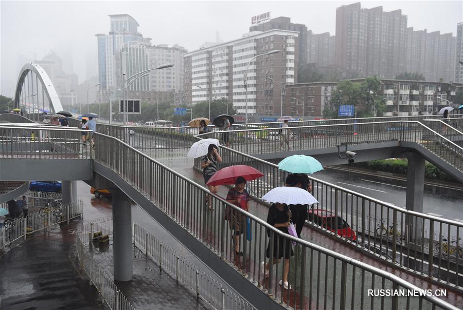 Сильный дождь в Пекине