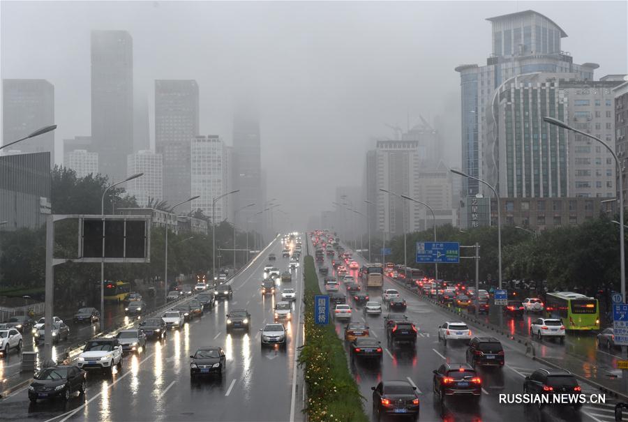Сильный дождь в Пекине