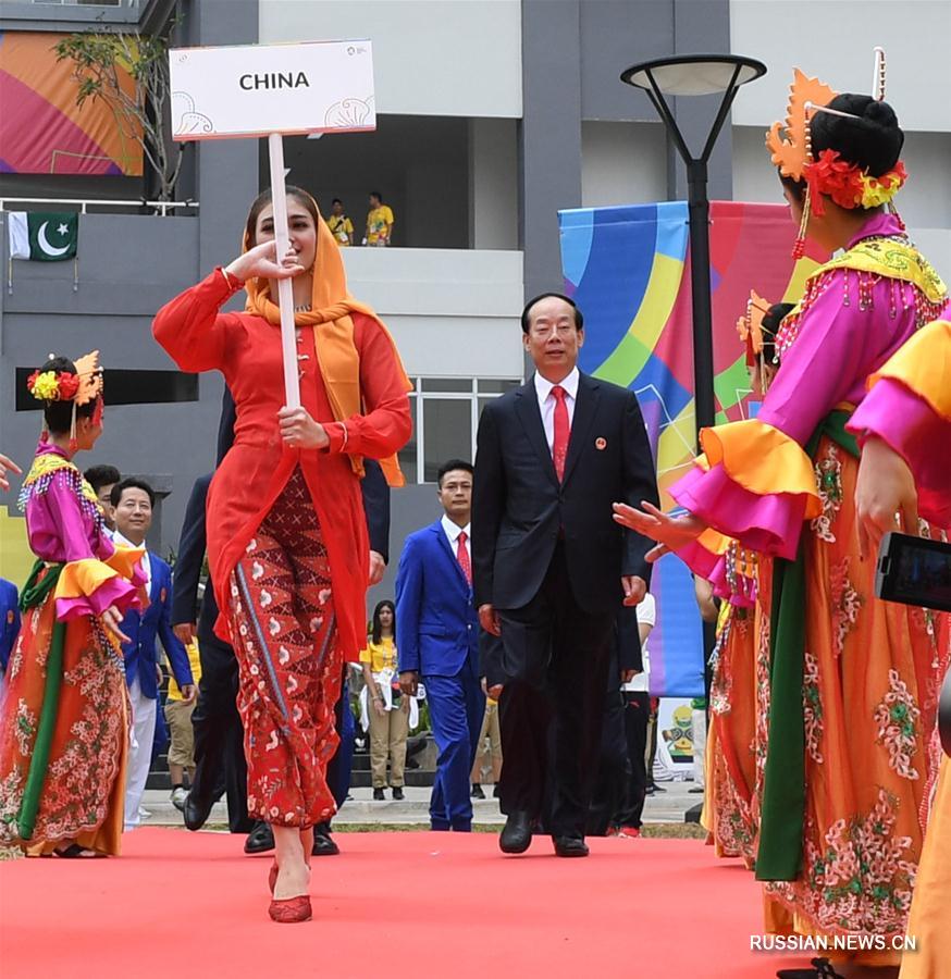 Делегация китайских спортсменов 18-х Азиатских игр провела церемонию поднятия государственного флага КНР в Джакарте 
