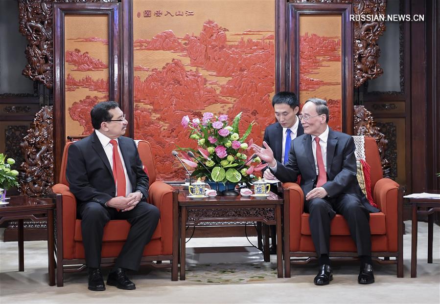 Ван Цишань встретился с делегацией Сальвадора