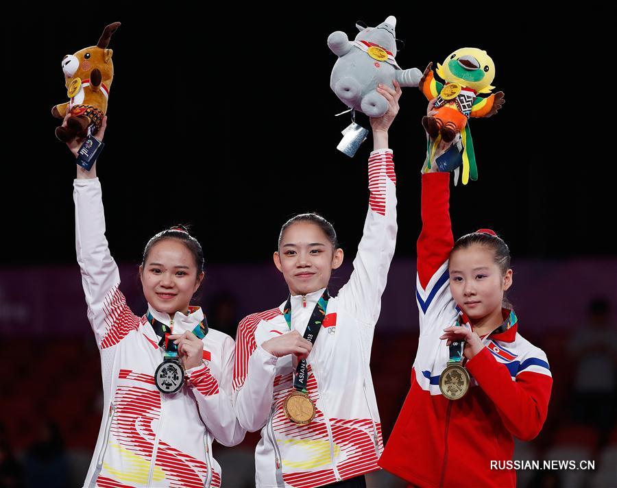 18-е Азиатские игры -- Спортивная гимнастика: победный дубль китайских гимнасток на брусьях