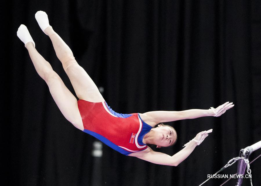 18-е Азиатские игры -- Спортивная гимнастика: победный дубль китайских гимнасток на брусьях