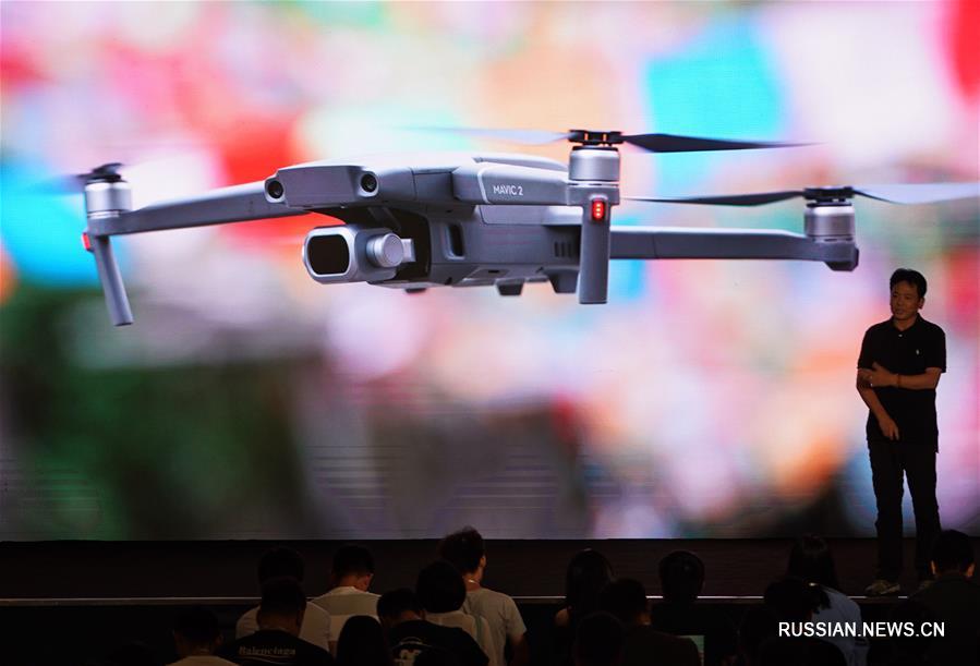 Компания DJI презентовала в Пекине новые модели дронов серии "Юй"