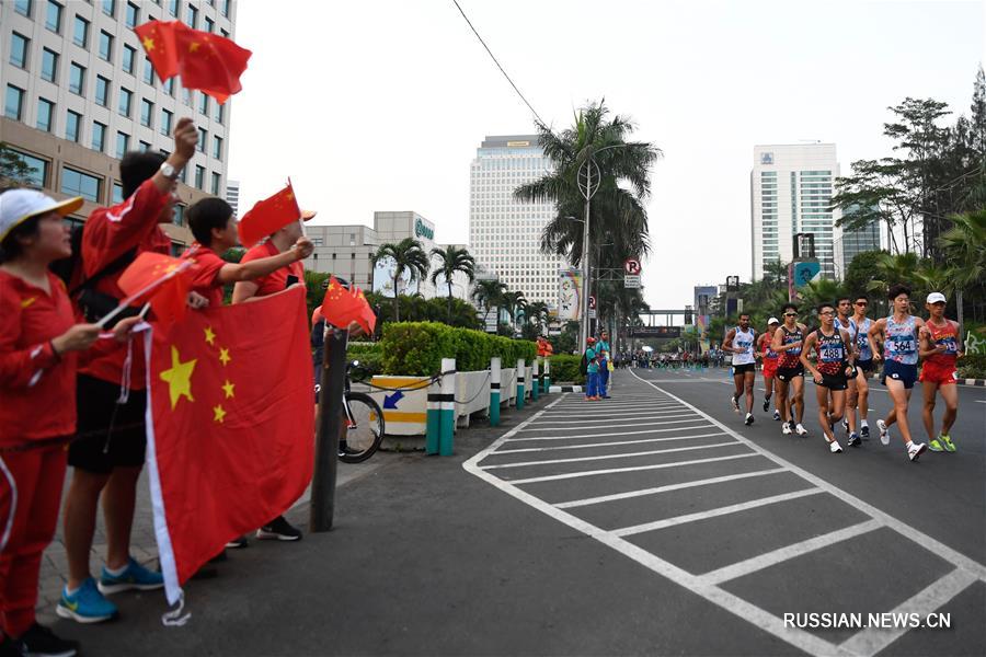 18-е Азиатские игры -- Легкая атлетика, спортивная ходьба: китайские скороходы выиграли золото и бронзу на дистанции 20 км