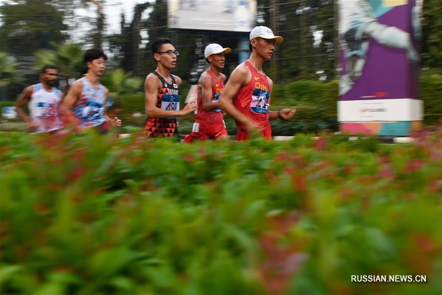 18-е Азиатские игры -- Легкая атлетика, спортивная ходьба: китайские скороходы выиграли золото и бронзу на дистанции 20 км