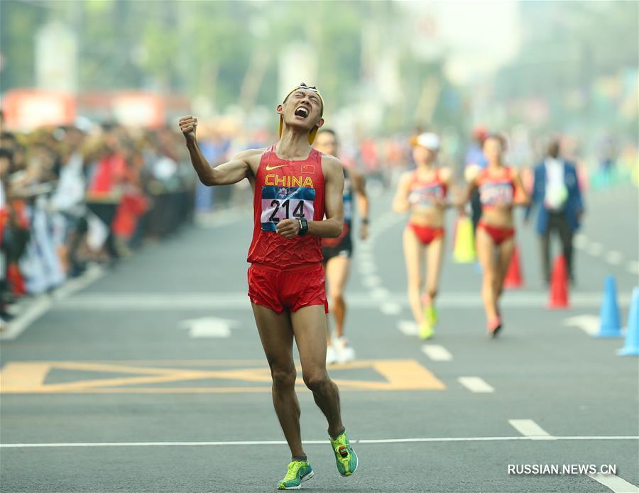18-е Азиатские игры -- Легкая атлетика, спортивная ходьба: китайские скороходы выиграли золото и бронзу на дистанции 20 км
