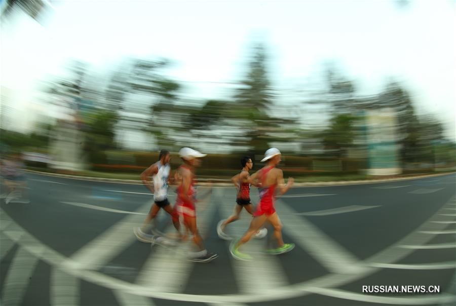 18-е Азиатские игры -- Легкая атлетика, спортивная ходьба: китайские скороходы выиграли золото и бронзу на дистанции 20 км