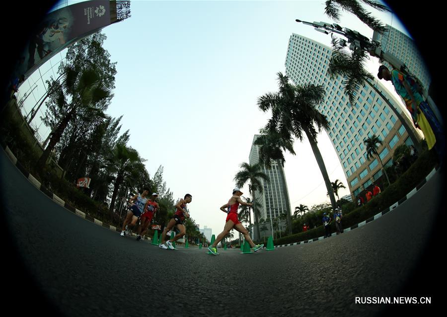 18-е Азиатские игры -- Легкая атлетика, спортивная ходьба: китайские скороходы выиграли золото и бронзу на дистанции 20 км