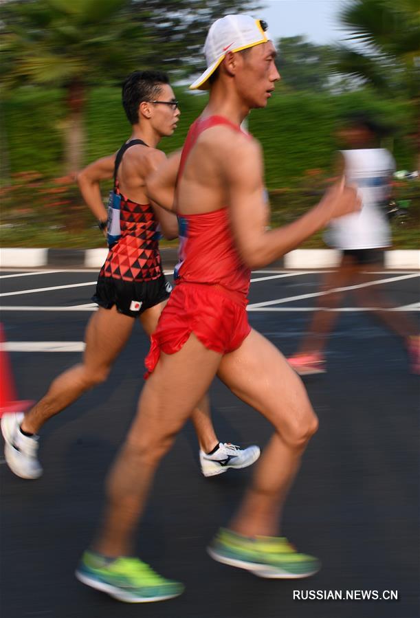 18-е Азиатские игры -- Легкая атлетика, спортивная ходьба: китайские скороходы выиграли золото и бронзу на дистанции 20 км