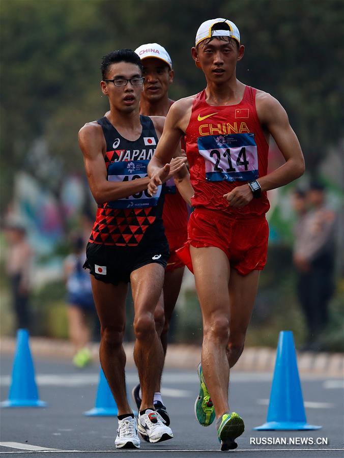 18-е Азиатские игры -- Легкая атлетика, спортивная ходьба: китайские скороходы выиграли золото и бронзу на дистанции 20 км