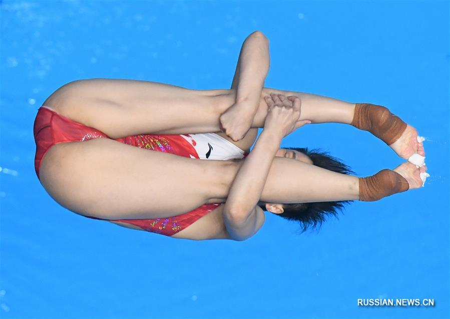 18-е Азиатские игры -- Прыжки в воду с трамплина 3 м /женщины/: китаянка Ши Тинмао завоевала первое место