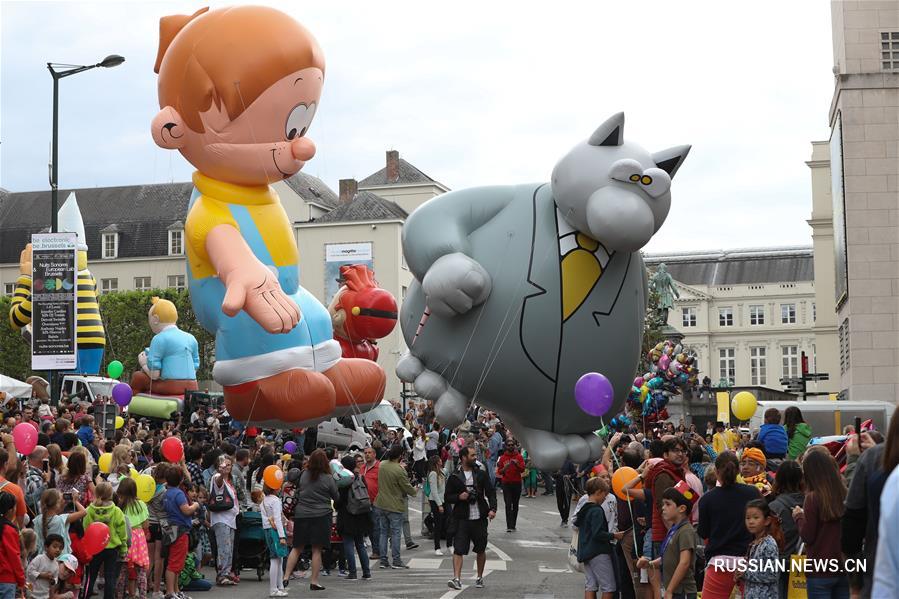 В Брюсселе прошел парад надувных фигур карикатурных персонажей