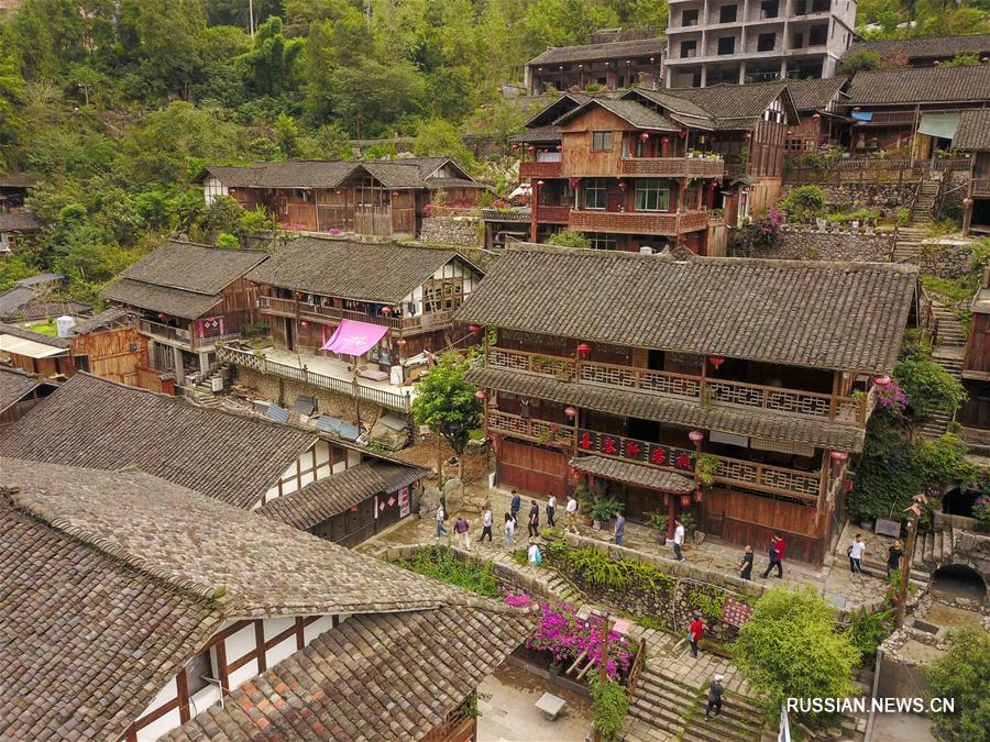 Сельский туризм способствует процветанию старинного городка в Чунцине