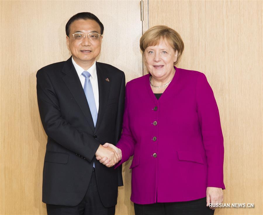 Ли Кэцян встретился с канцлером ФРГ Ангелой Меркель