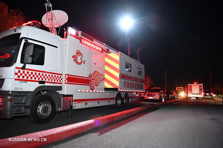 Пожар произошел на одном из складов в китайском городе Тяньцзинь