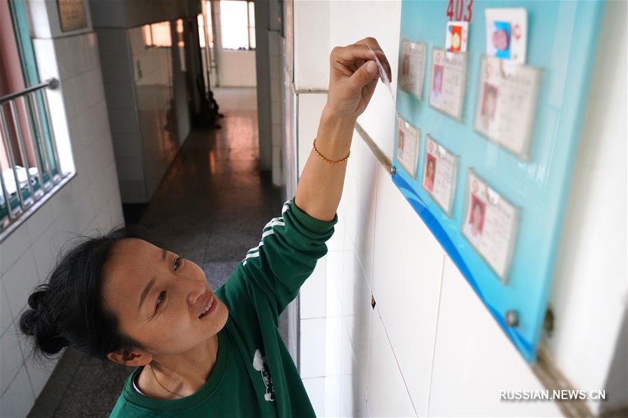Цзэн Вэньпин -- учительница из Цзянси, которая работает с детьми с ограниченными возможностями